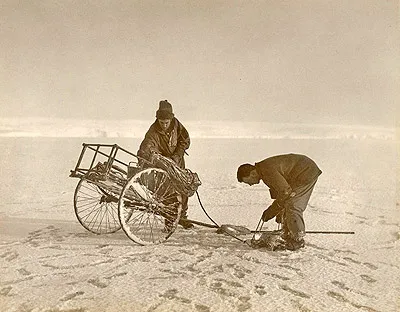 Laseron Hunter with hand cart containing dredging gear off Cape Denison Sep 1912