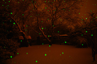 Snow at night lit by laser pen