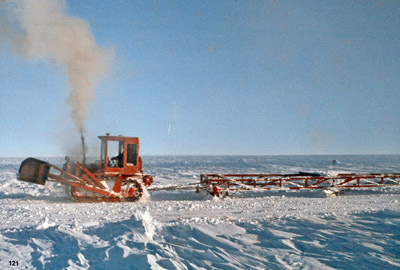 Dragging the skiway for the planes