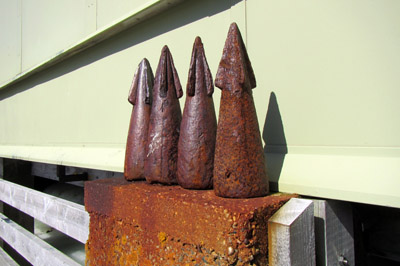 Old whale harpoon heads, probably brought from South Georgia to use as weights on fishing nets, now just ornamental