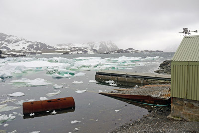 The old boatshed, wrecked jetty and old whale processing equipment