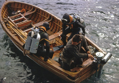 Tony Walker taking Pete Redfern and Charlie le Feuvre out to a dive site