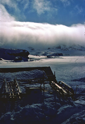 Fohn cloud bank rolling down over Jane Peak col winter