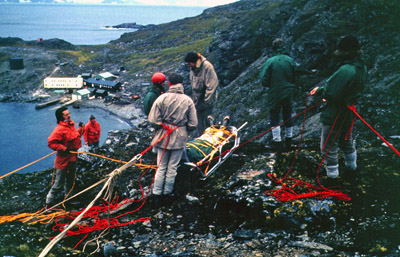 Practising stretcher rescue on the cliffs opposite base