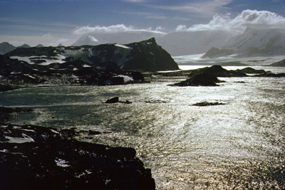 Sparkling green summer seascape over Billie Rocks