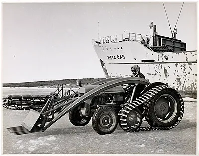 Tractor and Fork lift greatly assists landing and building operations at Mawson, Antarctica