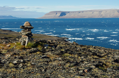 Bylot Island Overlooking Navy Board Inlet - Inuksuk with Baffin Island