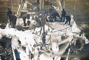 The fo'c'stle head of the Aurora sheathed with ice after a blizzard in Commonwealth Bay 